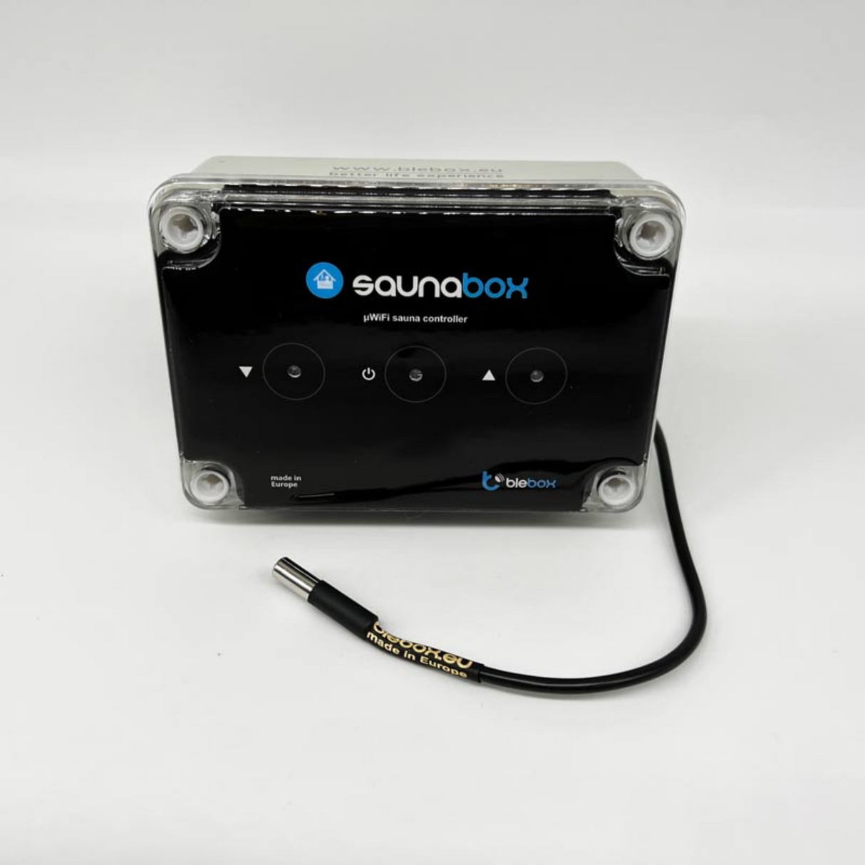 The Sauna WiFi Heating Controller ~ saunaBox by Blebox is shown in black with four front touch buttons, a connected sensor cable, and WiFi connectivity, displayed against a plain white background.