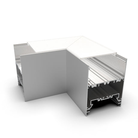 A 3D-rendered image displays the 90 Degree Connector for DPL70FL Profile, a silver, L-shaped aluminum extrusion with open channels and grooves, ideal as a corner connector for LED channels, shown on a white background.