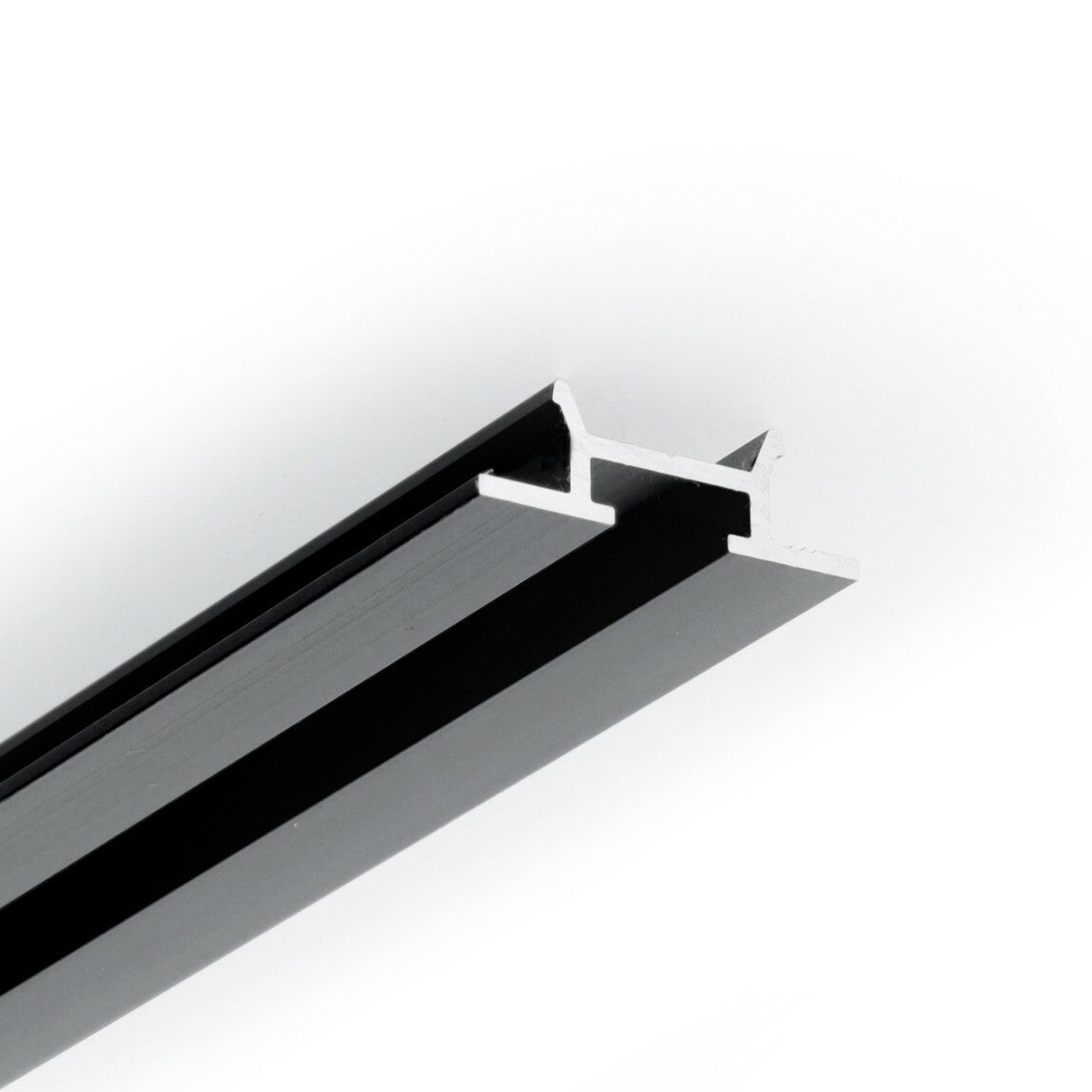 A close-up of the Complementary Profile ~ Model Pixy20-03, a black and silver aluminum T-slot extruded rail, photographed against a white background to highlight its cross-sectional shape and groove design.