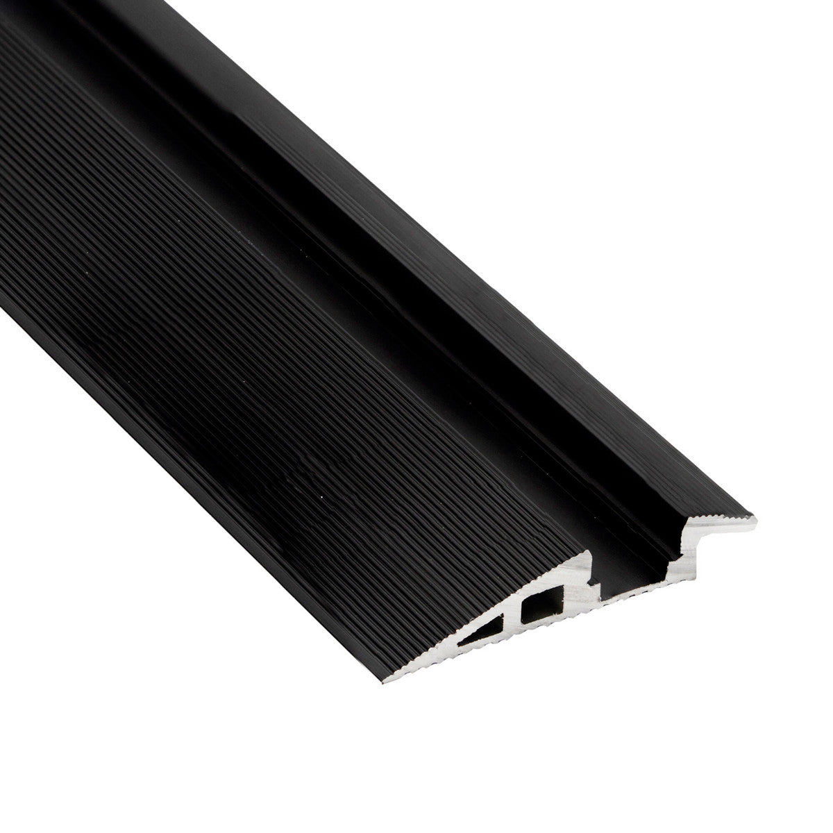 A close-up of the Floor Transition Strip LED Channel ~ Model Qatar shows its black, ridged aluminum ramp with a sloped, textured surface—providing an accessible, illuminated transition or treadable LED channel for doorways.