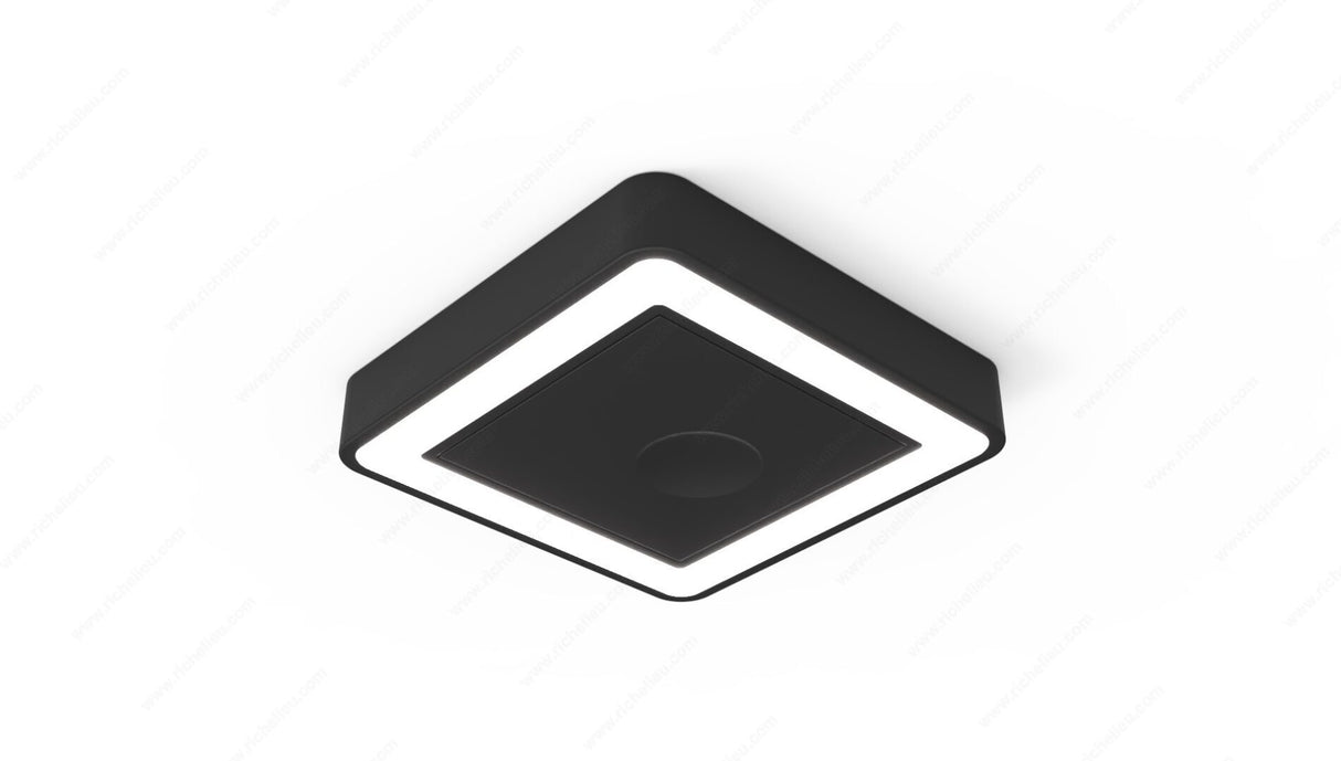The HIPSO D-MOTION TDM is a modern, square black recessed or surface mount LED light with a glowing white border and touch dimmer, shown installed on a plain white ceiling.