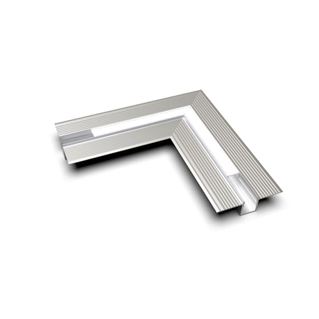 The Connector for Hide10 Profile is a metallic, L-shaped 90-degree connector with a ribbed texture and hollow inner channel, ideal for joining LED Channels or Hide10 Profile. It casts a soft shadow on a white background.