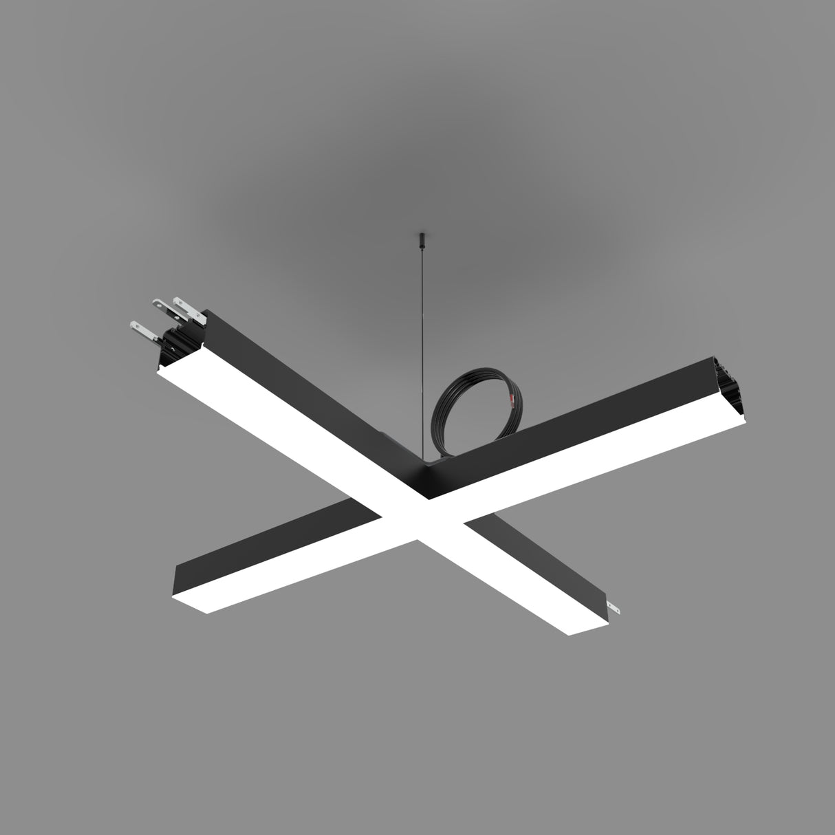 The PL55FL Modular LED Light Fixture System, a modern black X-shaped design, hangs from the ceiling by a thin cable with a coiled electrical cord visible at the center against a plain gray background.