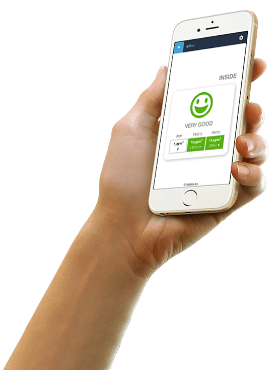 A hand holds a smartphone showing the airSensor by Blebox app with a green smiling face and “VERY GOOD” text—ideal for monitoring air quality using the Air Pollution Detector and Wi-Fi Air Quality Sensor.