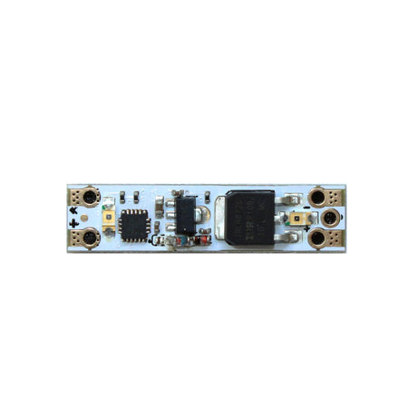 A close-up of the Miniature Daylight Switch for LED Channel ~ twilightSwitch by BleBox, showing its microchips, capacitors, and connectors—perfect for LED Channel applications—set against a plain white background.