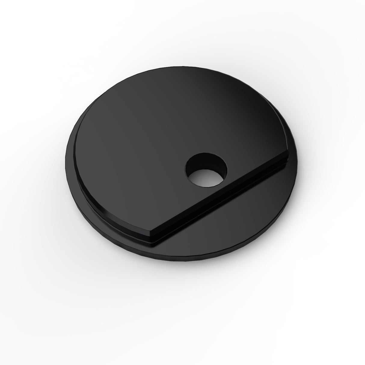 A Plastic End Cap for Cascade38 Profile, black and round with a central hole and a slightly raised flat edge on one side, is displayed at an angle against a white background.