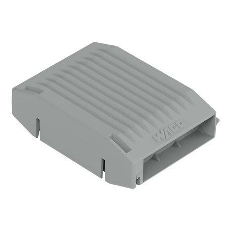 A gray, rectangular plastic cover with ridged texture and side notches, embossed with the WAGO logo—ideal for sealing the Waterproof Sealing Gelbox for Wago 221 Inline Lever-Nut Connectors or protecting them in a waterproof box.