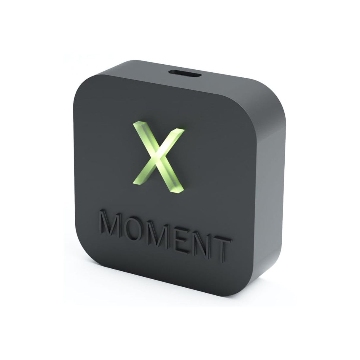 The Casambi Lighting Controller with Alexa Voice Control ~ Estol X-Moment is a black, square device with rounded edges, a glowing green X above MOMENT on the front, and a top slot for easy integration.