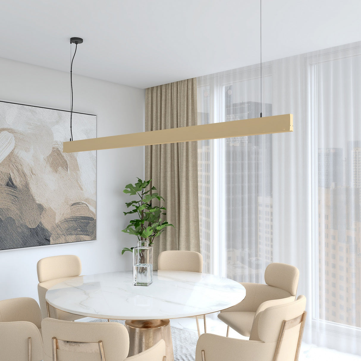 A modern dining room features a round white marble table, five beige chairs, a tall green plant in a glass vase, abstract wall art, floor-to-ceiling curtains, and Linear Pendant Lighting Channel ~ Model Lola. City buildings are visible through the windows.