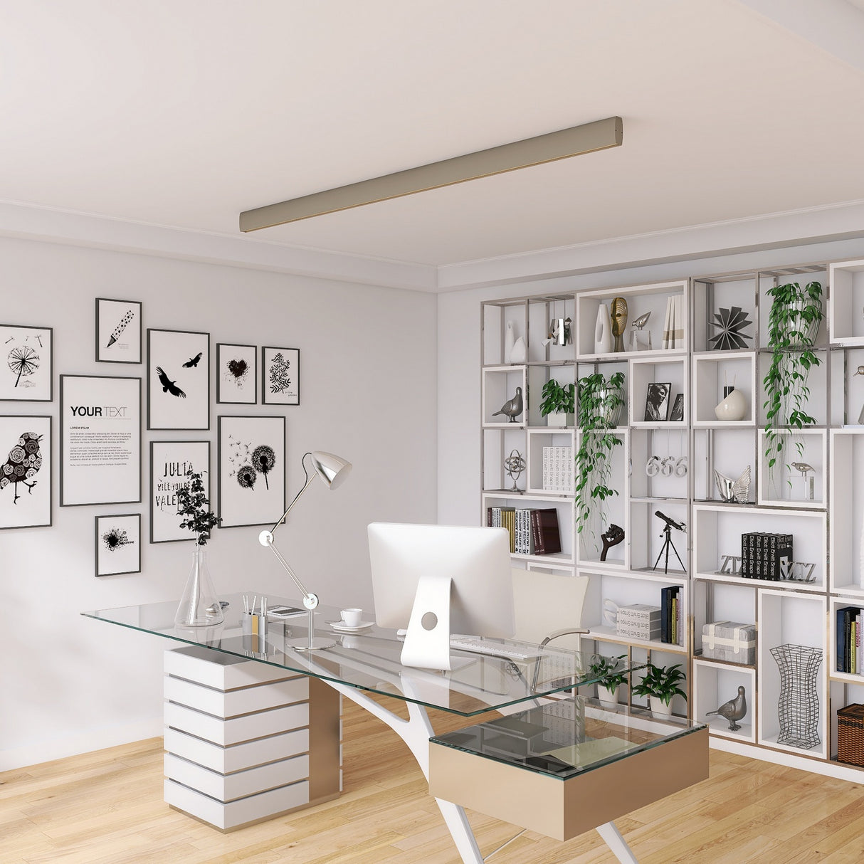 Modern home office with a glass desk, white computer, shelves for books and décor, art prints above the desk, and an Elegant Pendant Light Channel ~ Model Ricardo adding sophistication. Green plants and natural wood flooring complete the look.