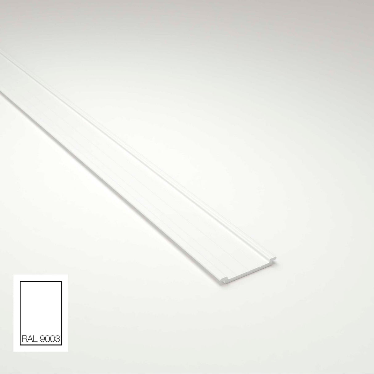 A white Complementary Profile for Antonio, Lola and Ricardo Profiles lies diagonally on a light gray surface; the bottom left corner features a RAL 9003 color swatch showing the white shade.