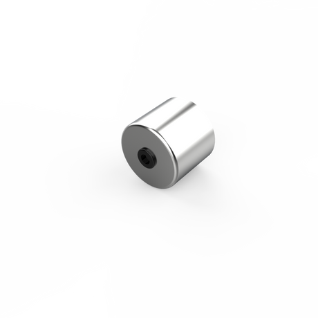 A sleek, small cylindrical metallic object with a central hole on one end, resembling the Aluminum End Cover for 1.50 Round Profiles, is shown on a plain white background.