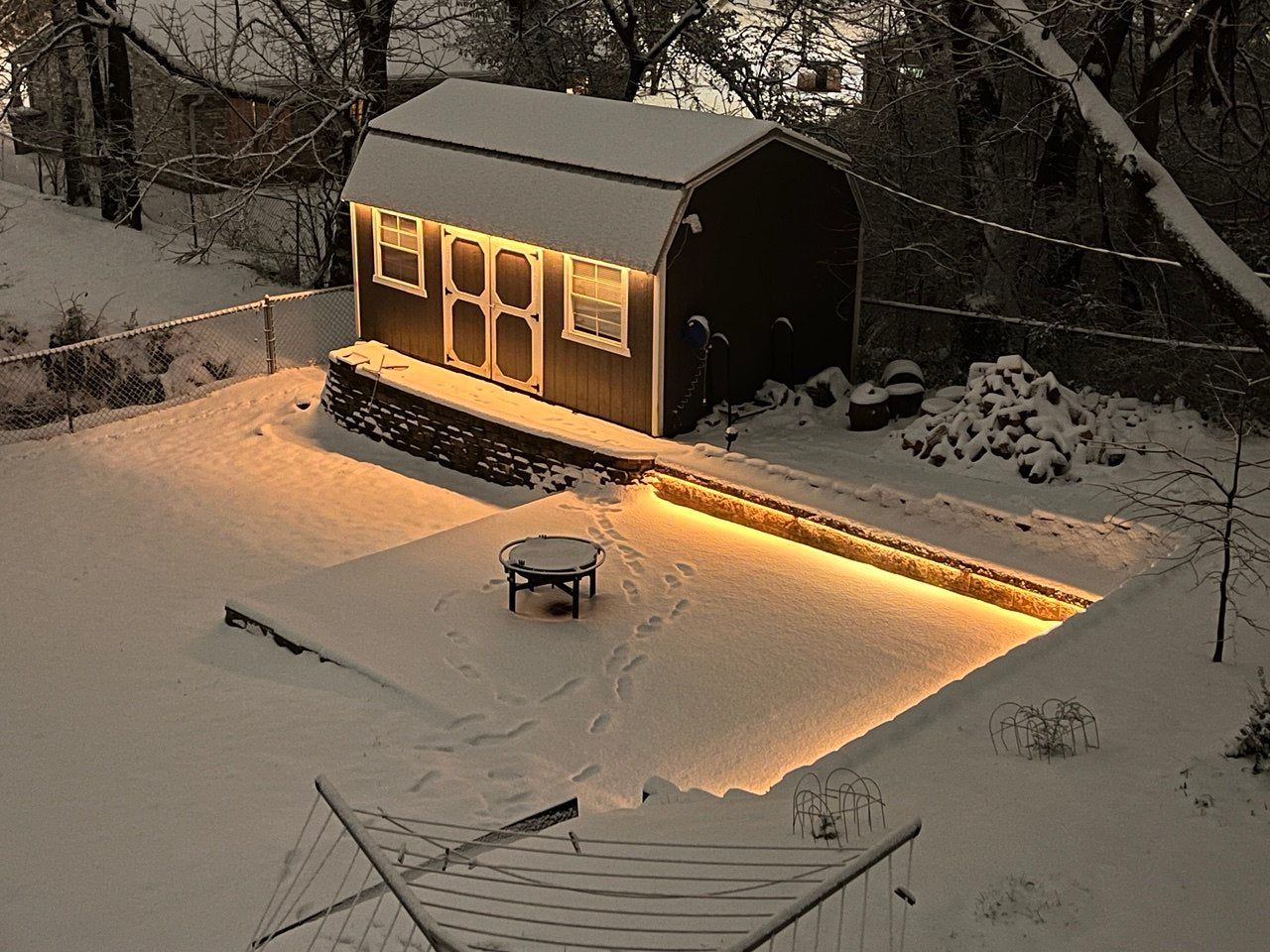 Outdoor LED lighting installation covered in snow, showcasing the durability and brightness of the lights in winter conditions - Wired4Signs USA