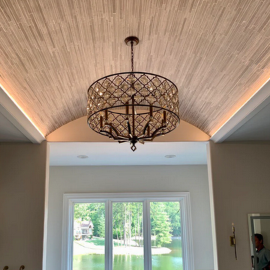 Architectural beam lighting integrated into vaulted ceiling beams