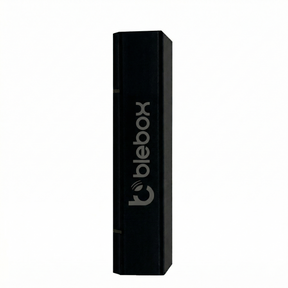 A black rectangular box stands upright with "openSensor by Blebox" printed vertically in large silver letters. Perfect for showcasing the Miniature Wi-Fi Smart Open/Close Sensor for smart home automation. Plain white background.