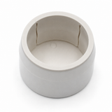 A white, round Structural PVC Joiner for Oslo Tube Profile with a smooth exterior and two vertical inner grooves, ideal for organizing lighting accessories, shown from above on a white background.