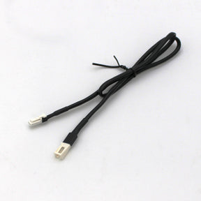 A coiled Micro-Plug Extension Cable - Male to Female, featuring black micro connectors, is neatly secured with a small black twist tie and placed on a plain white surface.