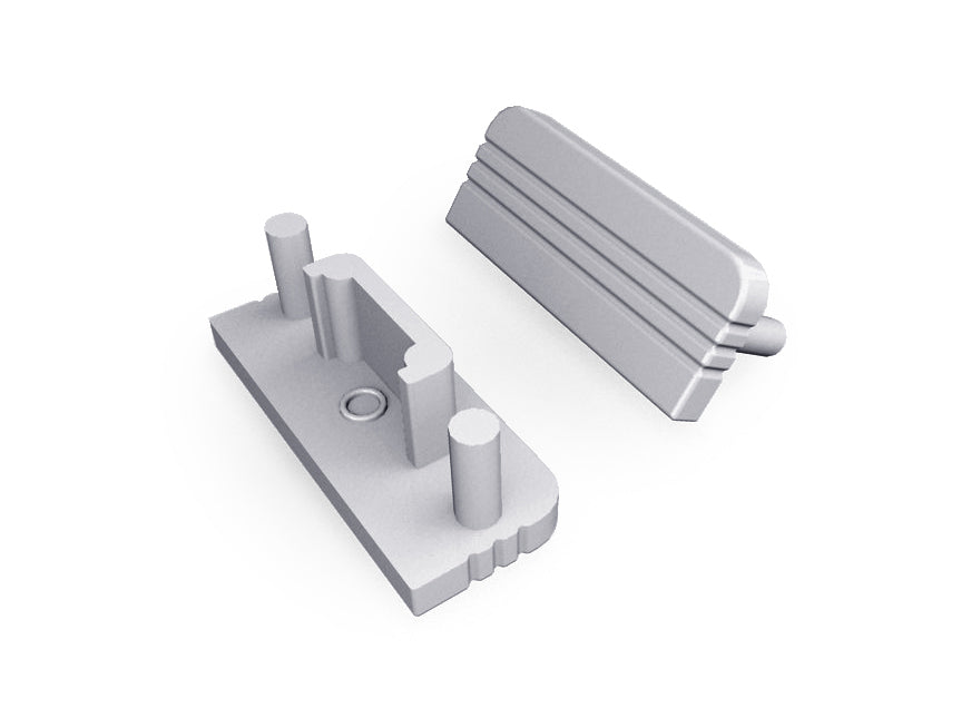 Two gray plastic components—an End Cap for the Surface10 Profile and a matching grooved cover—are displayed on a white background, providing essential LED accessories for a secure and tidy installation.