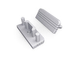 Two gray plastic components—an End Cap for the Surface10 Profile and a matching grooved cover—are displayed on a white background, providing essential LED accessories for a secure and tidy installation.