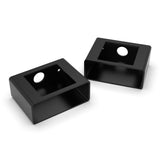 The Surface Mounting Bracket for Holston74 Tube Profile is a black rectangular enclosure with an open front and top holes, designed for easy surface mounting. Made of metal or plastic, it’s shown on a white background.