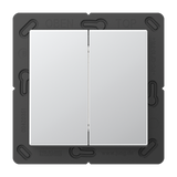 A close-up of the Casambi 4-Channel Wireless Radio Transmitter (Jung BLE A 595) shows two rectangular white buttons on a black frame labeled OBEN and TOP, featuring Bluetooth Low Energy for smart connectivity.