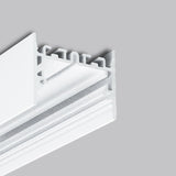 Close-up of a white, L-shaped 1.73″ Suspended/Surface Mount LED Channel ~ Model Pixel33-01 with grooves and ridges, set against a light gray background.