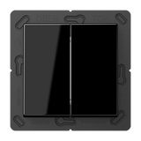 A black, glossy Casambi 4-Channel Wireless Radio Transmitter (Jung BLE A 595) for lighting control is mounted on a dark grey square frame labeled “OBEN” at the top and branded at the bottom.