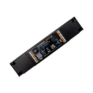 A rectangular black electronic device labeled RUNNING-LIGHT-V2, a SPI Pixel Controller with DALI and DMX for digital LED strips, with specification details and certification symbols printed in white on its surface. The device features connectors or mounting points at each end for easy integration with digital LED strips.