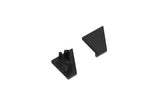 Two small, black, triangular plastic End Caps for the Corner10.v2 Profile—one featuring raised cylindrical pegs and the other flat—are displayed against a white background.
