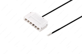 The Micro-Plug Distributor is a white, rectangular connector block with six slots, featuring an attached black cable ending in a small white plug, designed as a micro adapter for LED lighting systems.
