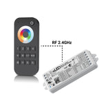 The RGB+TW Touch Wheel RF Remote Controller ~ EnoLED ES-RT-Z4-RGBCCT features a black RF LED remote with a color wheel, wirelessly connected via 2.4GHz to a white controller module with labeled terminals and technical info.