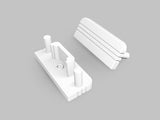 Two white, rectangular plastic End Caps for the Surface10 Profile—with rounded edges and protruding cylindrical sections—are displayed on a light gray background. Designed as essential LED accessories, these end caps ensure a seamless finish for your lighting installation.