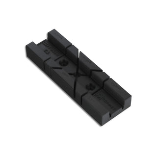 The C3 Click Diffuser Cutting Tool is a compact black plastic miter box with angled slots for precise cutting of C3 Click diffusers or LED profile systems. It includes two mounting holes and clear angle markings for accurate cuts.