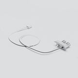 The Cut & Connect End Cap for Frankfurt Profile—a white, minimalist cable with a small connector on one end and a block-shaped, multi-pronged end cap on the other—rests coiled on a plain light gray background, perfect for linear lighting systems.