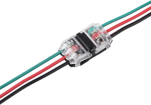 The 3-Pin Solderless Wire Splice Connector ~ Pelican Series securely joins green, red, and black wires with a transparent body, revealing internal components for a reliable wire splice—no soldering needed.