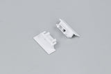 Two small white plastic End Caps for the Groove10.v2 Profile lighting fixture, each featuring a flat rectangular base and interlocking parts, are displayed on a plain light gray background.