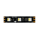 Close-up of a Long-Range RGBW Pixel IP20 LED Strip (12V) ~ Enttec 8PX Series segment, showing three LEDs, electronic components, and copper pads labeled for power, data, and ground.