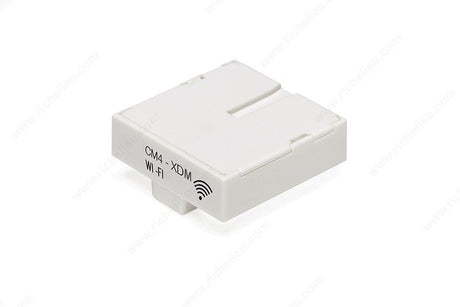 A white rectangular CM4-XDM Wi-Fi Module, labeled “Smart Wireless LED Controller for X-Driver D-Motion (24V),” features a Wi-Fi symbol in the corner and is displayed against a plain white background.
