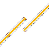 Two Tunable White COB IP20 High CRI LED Strips (24V) from the UniCCT Series, featuring yellow diodes and visible circuit elements, are arranged diagonally and parallel on a white background. These strips provide precision illumination with high color rendering, making them ideal for environments where color accuracy is essential.