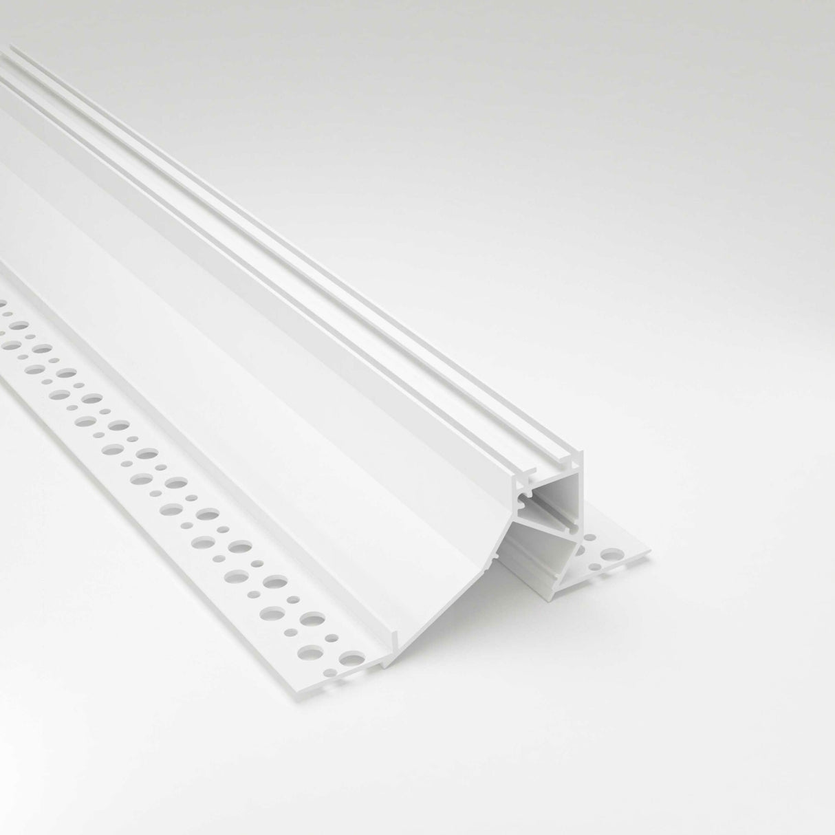 The Recessed Wall Wash LED Lighting Channel ~ Model Acapulco is a white angled plastic trim with multiple round holes along its flat edge, perfect for LED profile use in construction or drywall, shown on a plain white background.