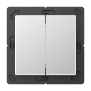 A close-up of a Casambi 2-Button Wireless Wall Switch, Model Jung BLE A 595, featuring a black frame and two white rectangular buttons labeled OBEN and TOP at the top; this switch operates battery-free.