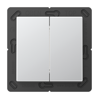 A close-up of a Casambi 2-Button Wireless Wall Switch, Model Jung BLE A 595, featuring a black frame and two white rectangular buttons labeled OBEN and TOP at the top; this switch operates battery-free.