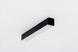 Black rectangular 0.51″ Suspended/Surface Mount Bendable LED Channel ~ Model Bend8 with a frosted diffuser panel mounted on a white surface.