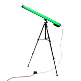 The Portable Long Range Casambi RGBW Tube Light, in green, is mounted on a black tripod stand with a foot switch and power cord—perfect for stage lighting—shown against a plain white background.
