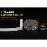 The Color IP44/IP66 Neon Flexible LED Light Line (24V) ~ Flex Ultra Slim Series, just 4mm wide, stands upright beside two stacked U.S. quarters—its slim profile nearly matches the coins’ 3.9mm thickness for a truly sleek look.
