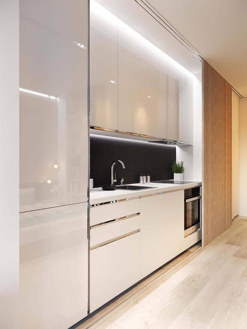 Compact Contemporary Kitchen with Under Cabinet LED Strip Lights and Dark Backsplash
