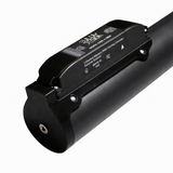 A close-up of the Portable Long Range Casambi RGBW Tube Light, a black cylindrical device with a mounted control unit labeled “SUNKY,” visible screws, indicator symbols, ports, and a metallic circular connector at one end.