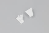 Two small, white, triangular plastic components—each an End Cap for the Corner10.v2 Profile lighting fixture—are displayed on a plain gray background. One end cap is flat, while the other features three short cylindrical pegs on its surface.