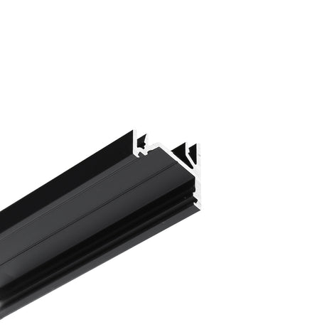 Close-up of the Surface Mount Corner LED Channel ~ Model Corner12.v2, a black aluminum profile with geometric cross-section, groove, and angled edges—ideal for under cabinet lighting, isolated on a white background.