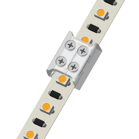 Close-up of an EnoLED Series 2-Pin Solderless White LED Strip Screw Connector (10mm) joining two LED light strips, showing visible orange diodes and black components, secured by a clear plastic cover and four silver screws.